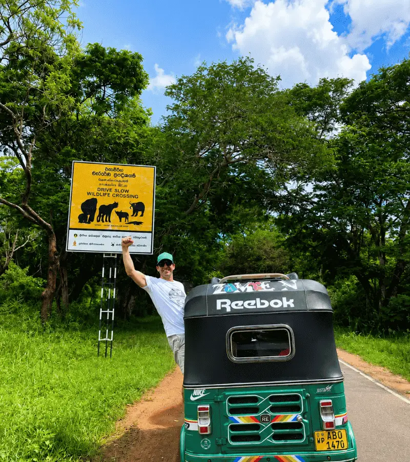 Tuk tuk driving from Kandy to Mahiyanganaya through mountain roads and the 18 Bend Road, Sri Lanka