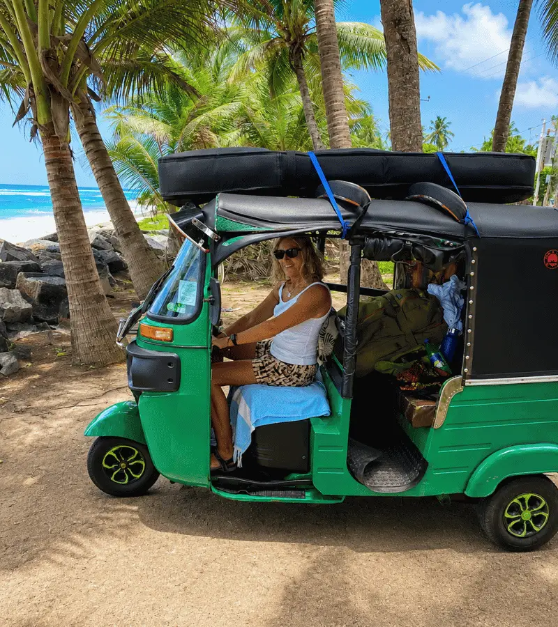Driving into Tangalle by tuk tuk along Sri Lanka's southern coastline through coconut estates and fishing villages