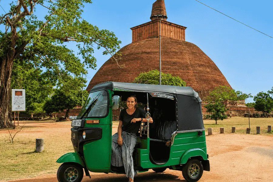 Exploring Polonnaruwa ancient ruins by tuk tuk, Sri Lanka