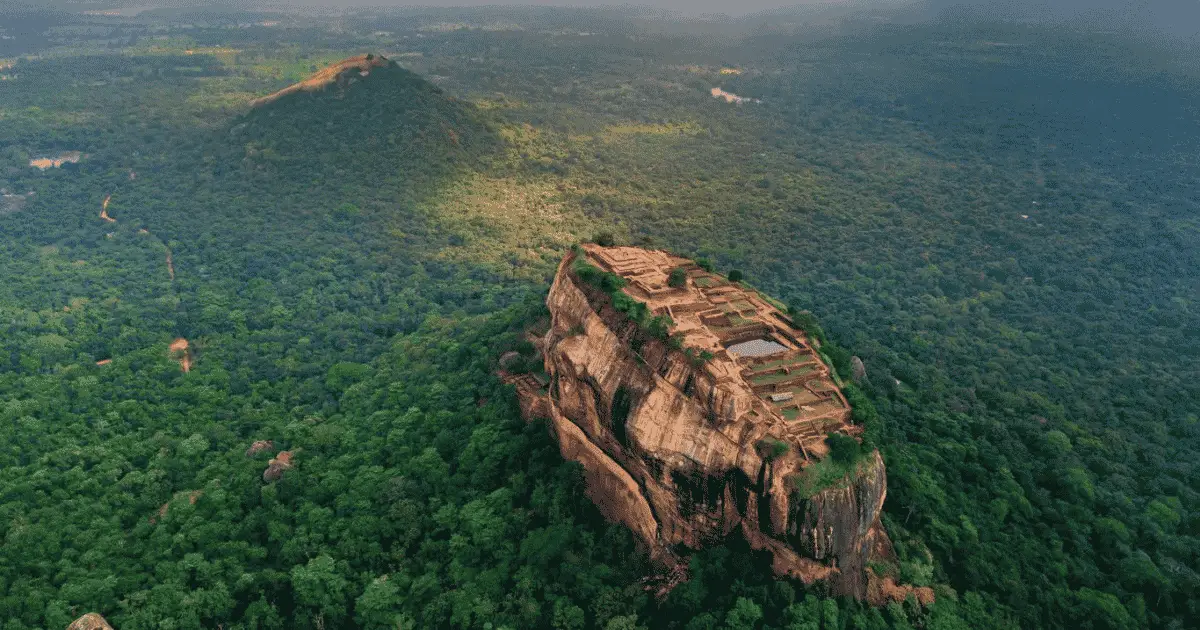 Sigiriya Rock Fortress rising above the jungle in Sri Lanka's Cultural Triangle