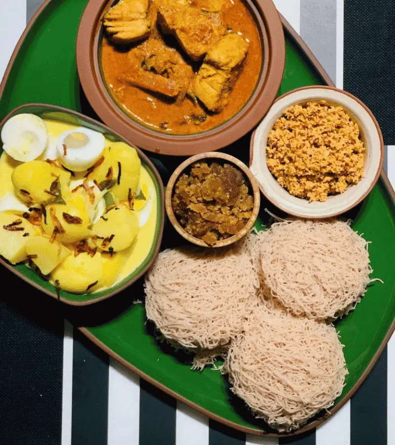 String hoppers (Idiyappam) in Sri Lanka — thin steamed rice noodle pancakes served with coconut sambol and curry